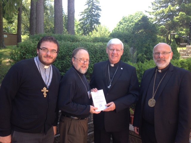 Fr Alexander, Fr Peter, His Excellency Bishop Ken, and Archbishop Daniel J Bohan, Archbishop of Regina and Chair of the CCCB Episcopal Commission